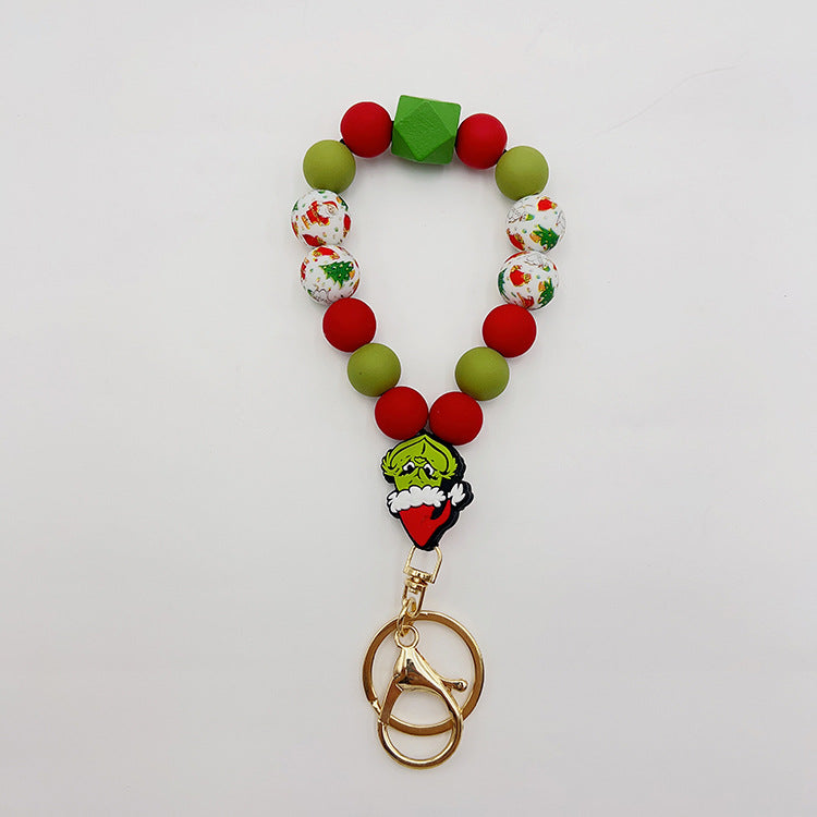 Wholesale Silicone Pumpkin Cow Ghost Dog Paw Wooden Bead Bracelet Keychain